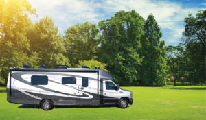 Class B+ Motorhome on a grassy field