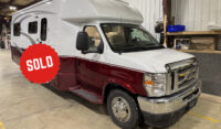 Red and white class B+ Motorhome